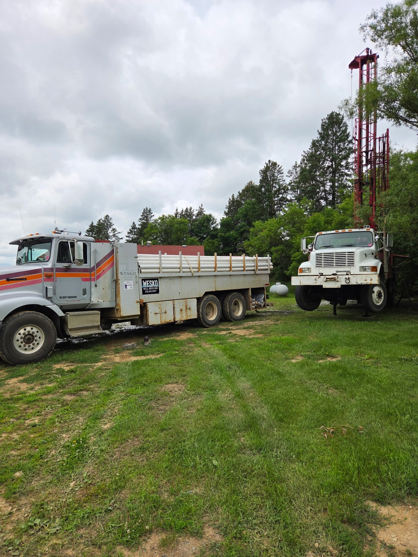 WESKO rig and supply trucks on site
