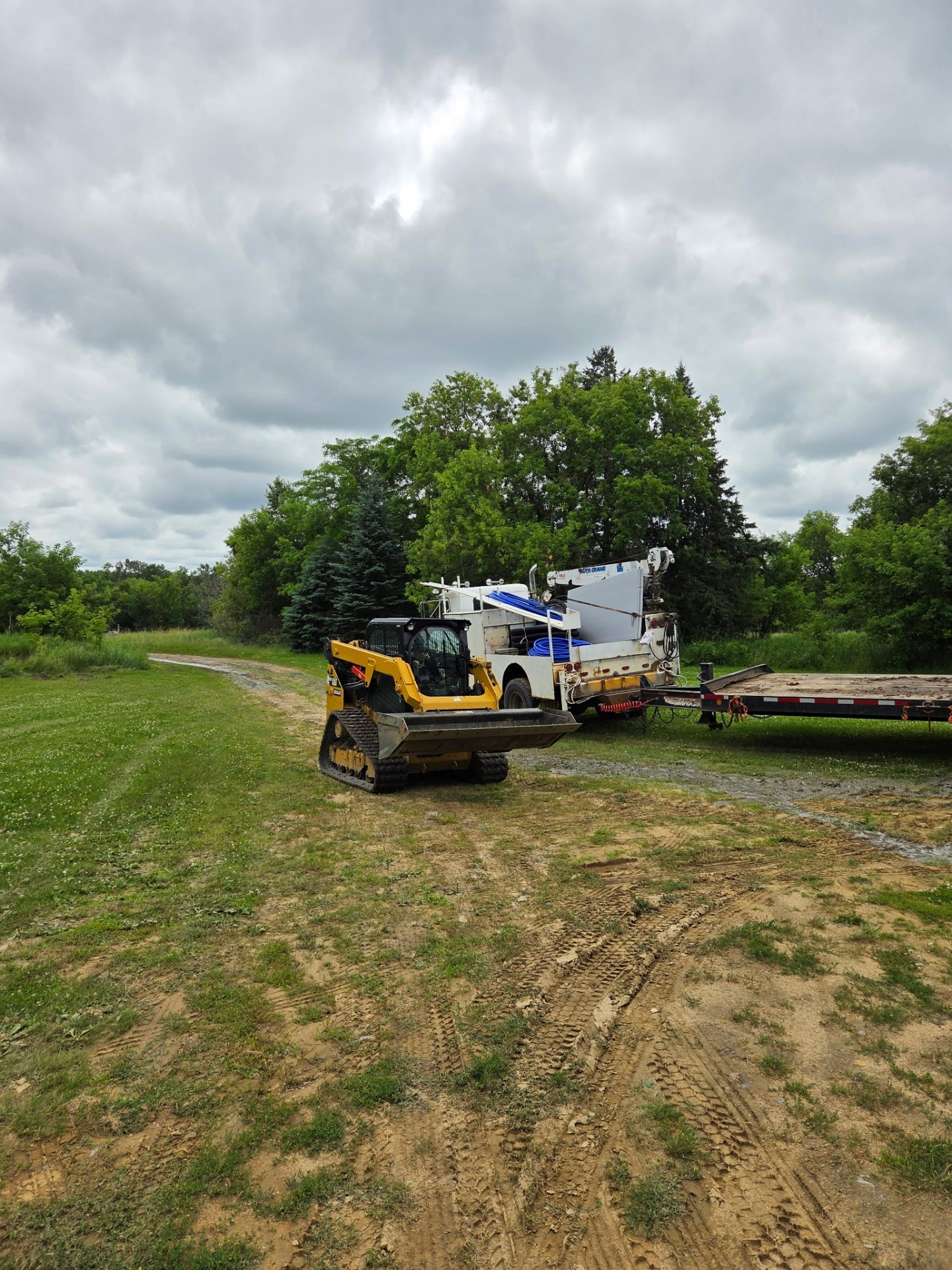 Skid steer with WESKO service truck