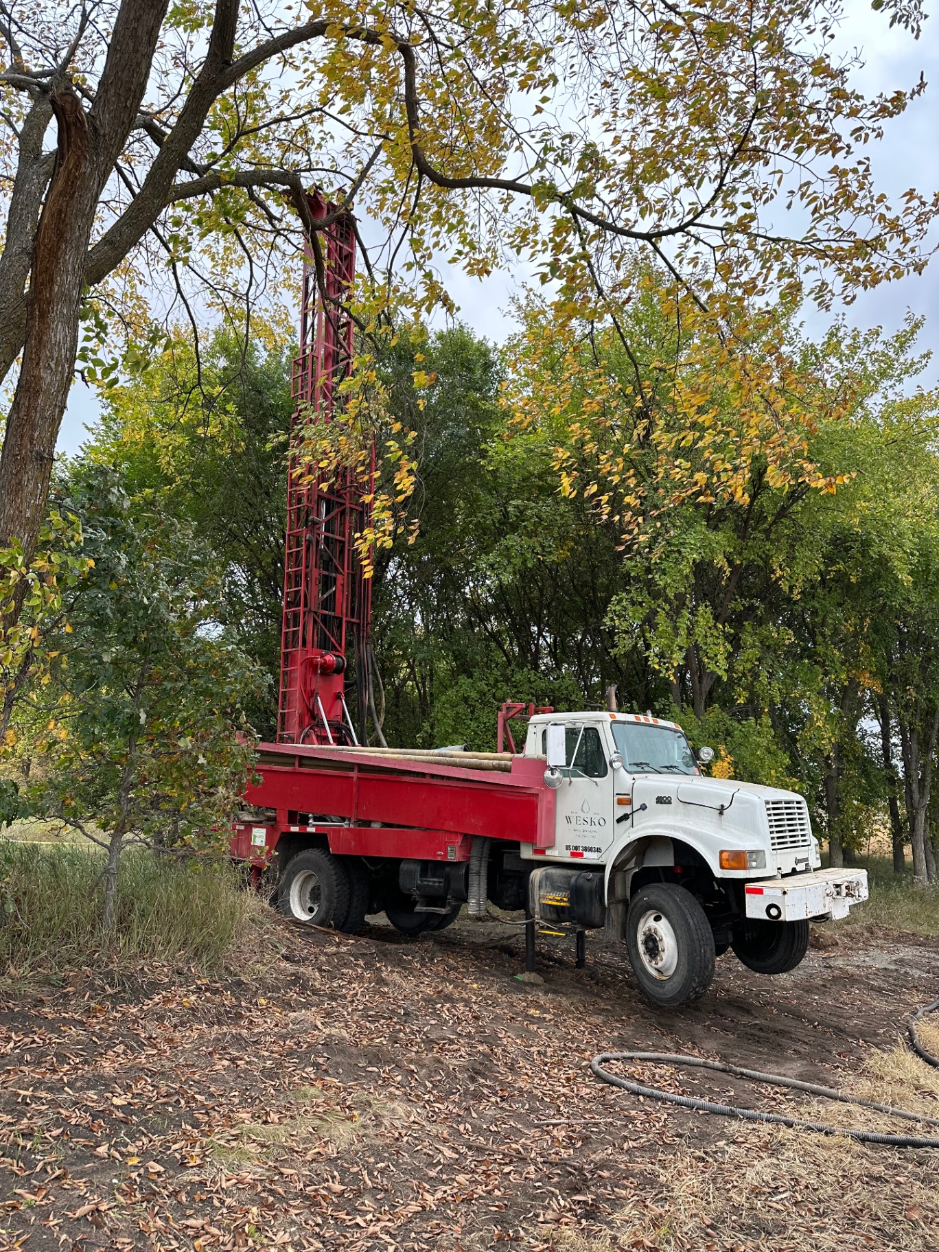 WESKO drilling rig under autumn trees